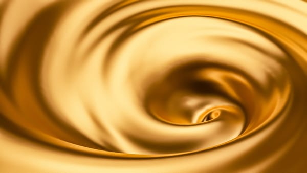 Liquid gold spiralling toward a centre
